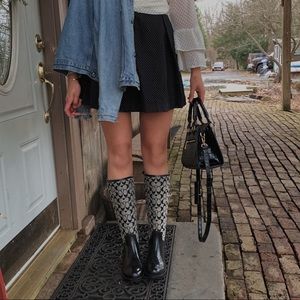 Coach “tristee” logo rubber rain boots